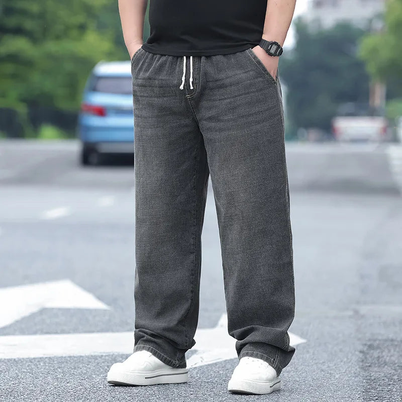8XL Oversize Jeans Men Autumn Fashion Streetwear Pant Plus Size Cargo Jeans Soft Cotton Loose Baggy Casual Jeans For Dad Husband